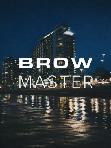 הכיתוב Browmaster על רקע בניין לצד המים בלילה